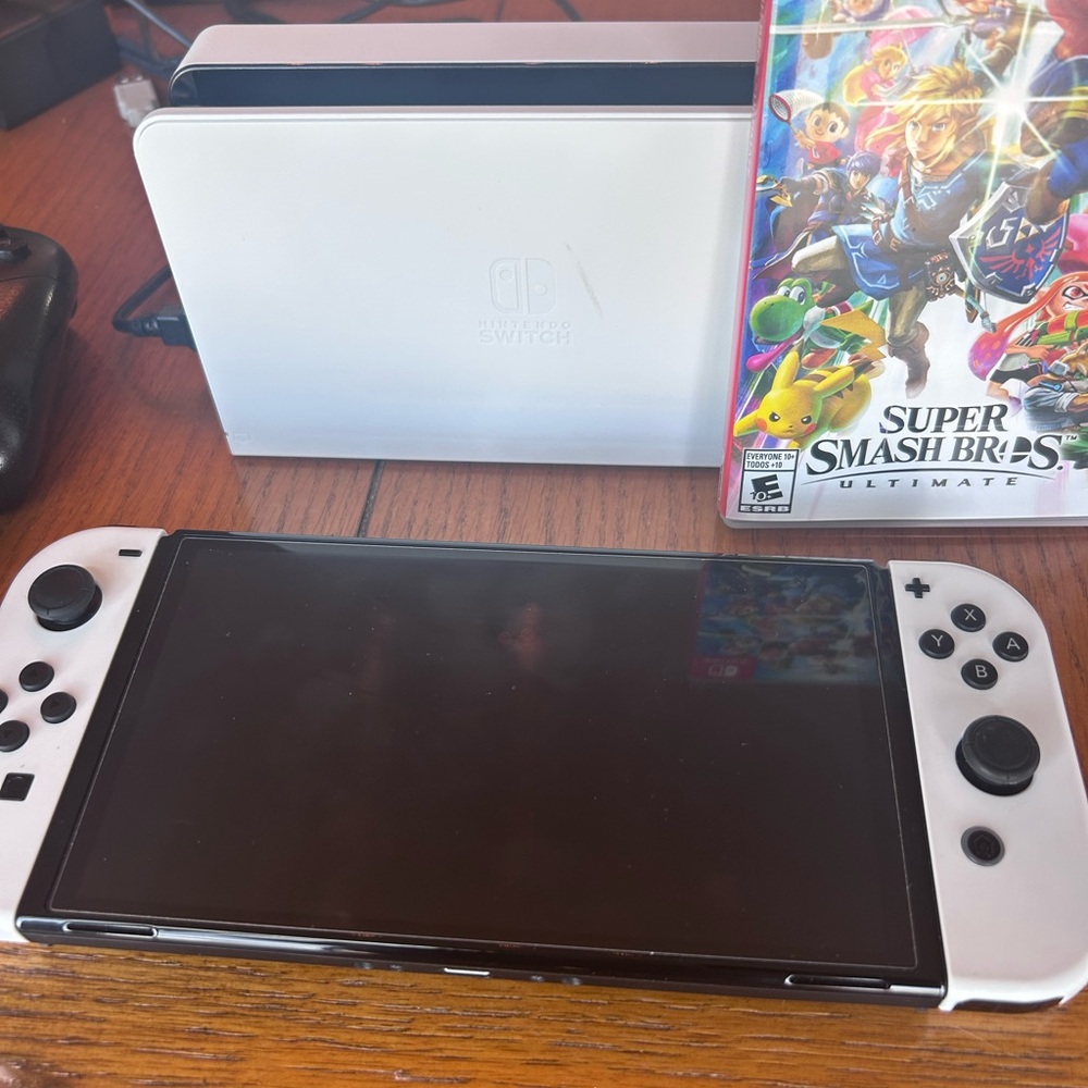 Nintendo Switch OLED with Super Smash Brothers, pro controllers 🎉